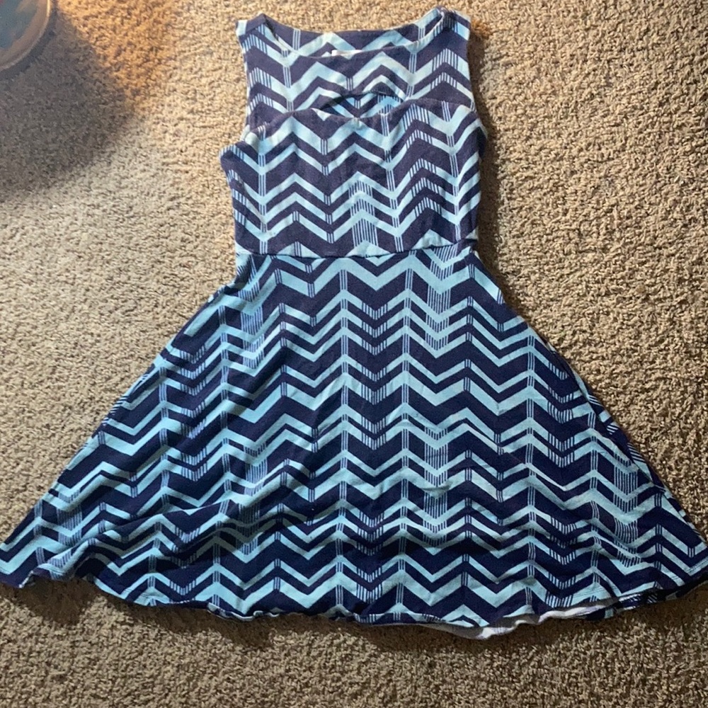 Chevron form fitting mini dress w/ small cutout